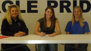 From left: SCC volleyball coach Carrie Puhalla, Axtell’s Hannah Mitchell, and Mitchell’s coach at Axtell, Pam Buessing.