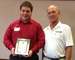 Brandon Barta, left, poses with Dave Stara, service manager at Plains Equipment Group in David City.