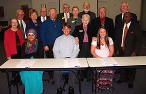 

Members of SCCs Board of Governors gathered around three students to commemorate April as Community College Month. Seated, from left: Iman Alsaadi, James Holder and Paige Smith. Standing, from left: Ruth Johnson, Lynn Schluckebier, Nancy Seim, Ed Heiden, Terrence Kubicek, Robert Feit, Kathy Boellstorff, Helen Griffin, Steve Ottmann, Bill Beltz, Dale Kruse, and Edward Price.
