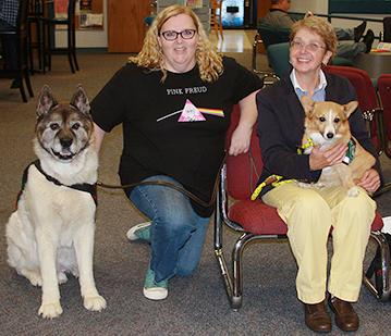 Left to right, Sunny, a ten-year-old Akita; Lisa Rank, president of the SCC Psychology/Sociology Club; Dr. Katherine Zupancic, principal researcher; and Corgi, 9.